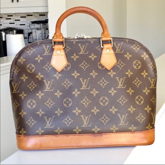 Authentic Louis monogrammed Alma - Picture 2 of 7